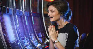 Happy Woman Playing Slot Machines Casino
